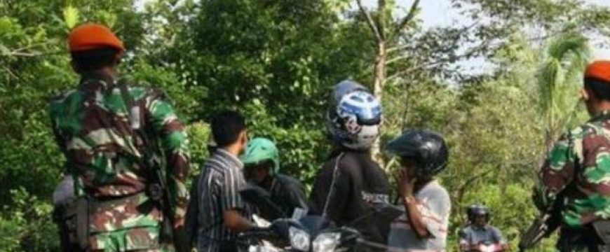 Two policemen, guard shot dead near US mine in Indonesia