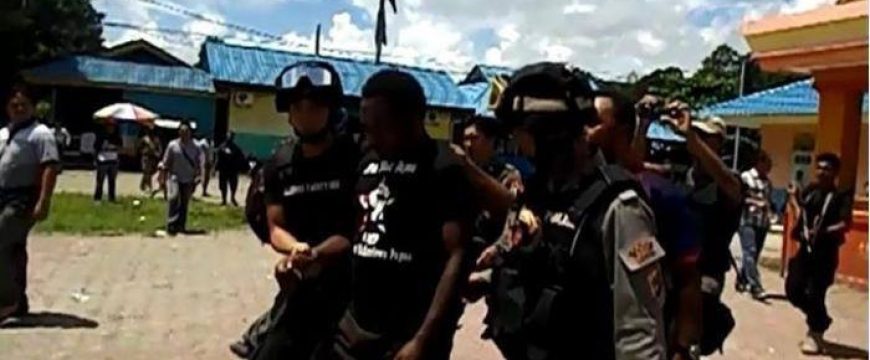 West Papuan journalist John Kuayo arrested by Indonesian police for wearing a “Free West Papua” t-shirt